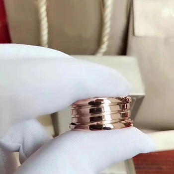 Forår-formet titanium stål ring og rosa guld til kvinder, oprindelige ring Engagement ring 5-10 Romerske tal