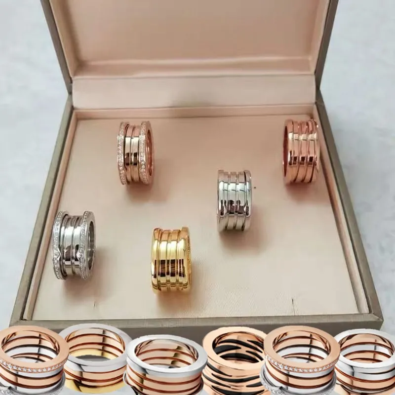Forår-formet titanium stål ring og rosa guld til kvinder, oprindelige ring Engagement ring 5-10 Romerske tal