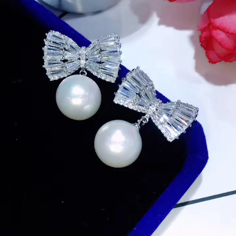 Nye Ankomst Hvid Shell Pearl, Bold Bownot Stud Øreringe Sølv Farve Micro Indlæg Cubic Zirconia Øreringe Til Kvinder